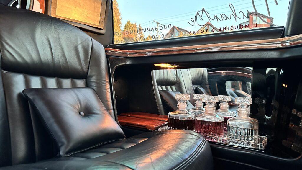 Luxury car interior with decanters